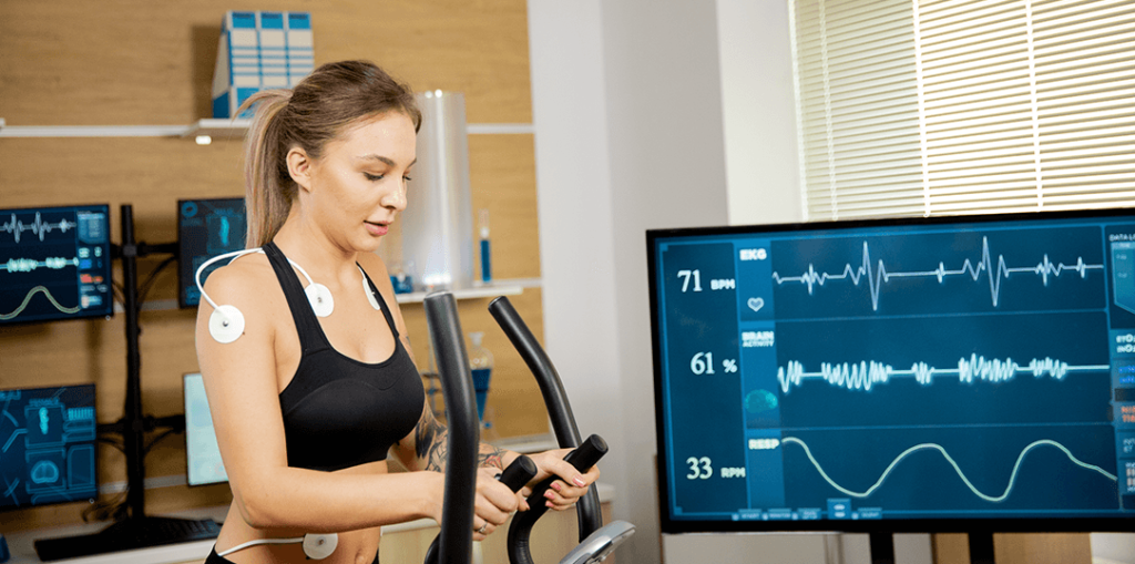 Woman doing stress test with holter monitor